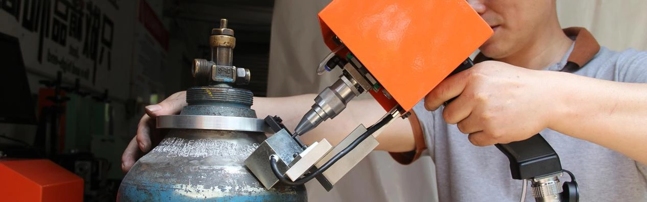 Industrial cylinder marking workstation prepared for curved-surface identification and fixture support