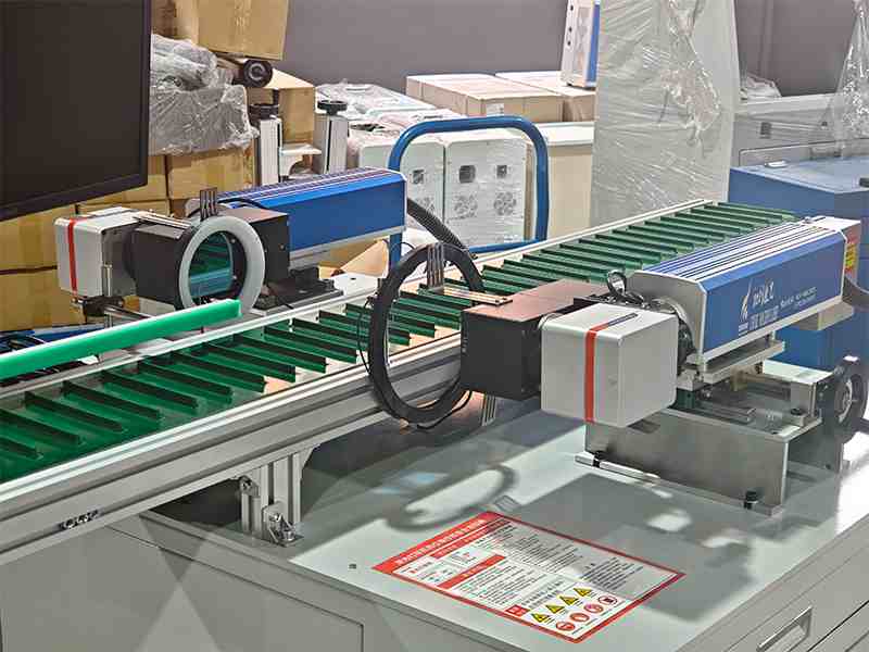 Laser marking machine with two sets of visual modules at work