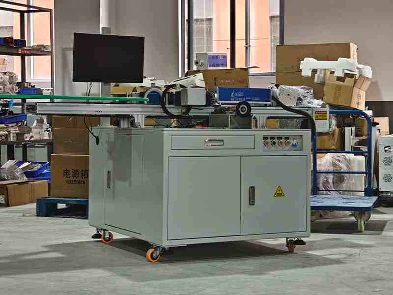 A laser marking machine using two sets of vision modules