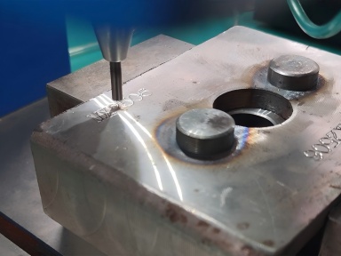 sample scribing and dot peen marking for an automobile manufacturer