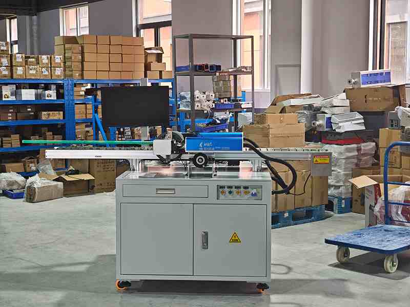 A laser marking machine using two sets of vision modules