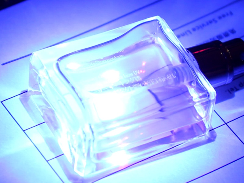 UV laser marking on perfume bottle