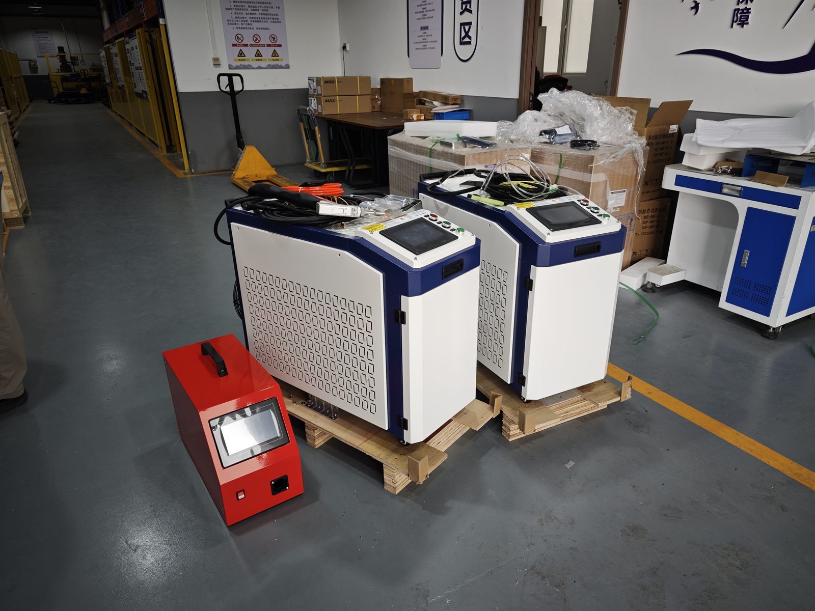 Operator using 3000W handheld laser welding machine on motorcycle exhaust pipe