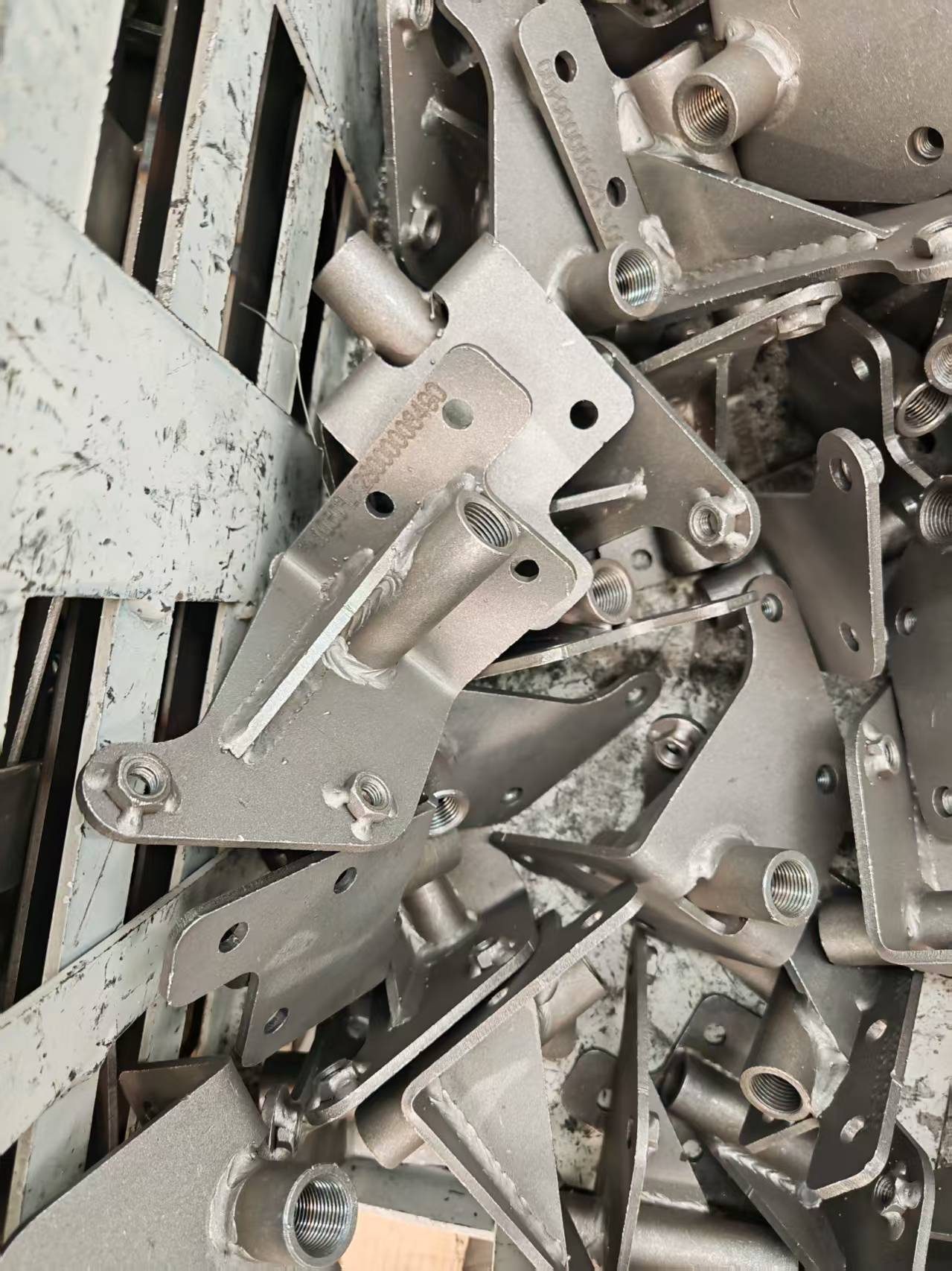 Mixed automotive chassis components suitable for benchtop dot peen traceability marking