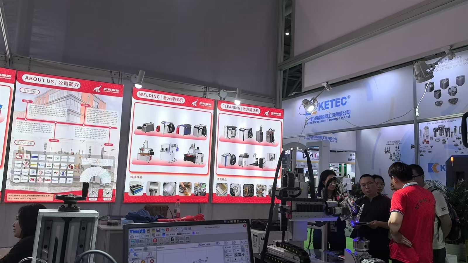 ZiXu booth panels showing laser welding and laser cleaning machines at Lijia Exhibition