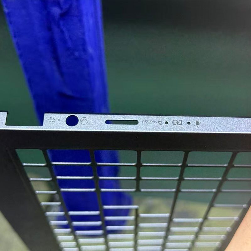 Three-side marking and anodized layer ablation application close-up