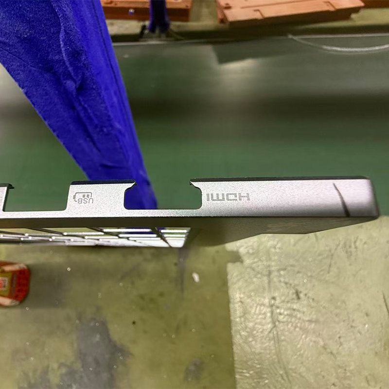 Notebook housing laser ablation application close-up