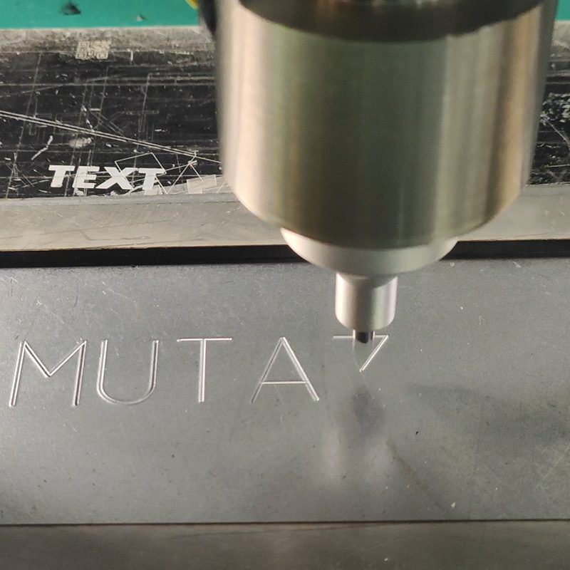 Side view of handheld electric dot peen K3 marker