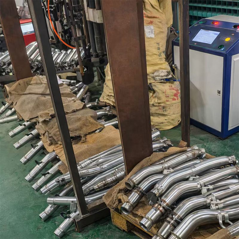 Zixu 2000W handheld laser welding system operating on the Jinmao motorcycle exhaust production floor