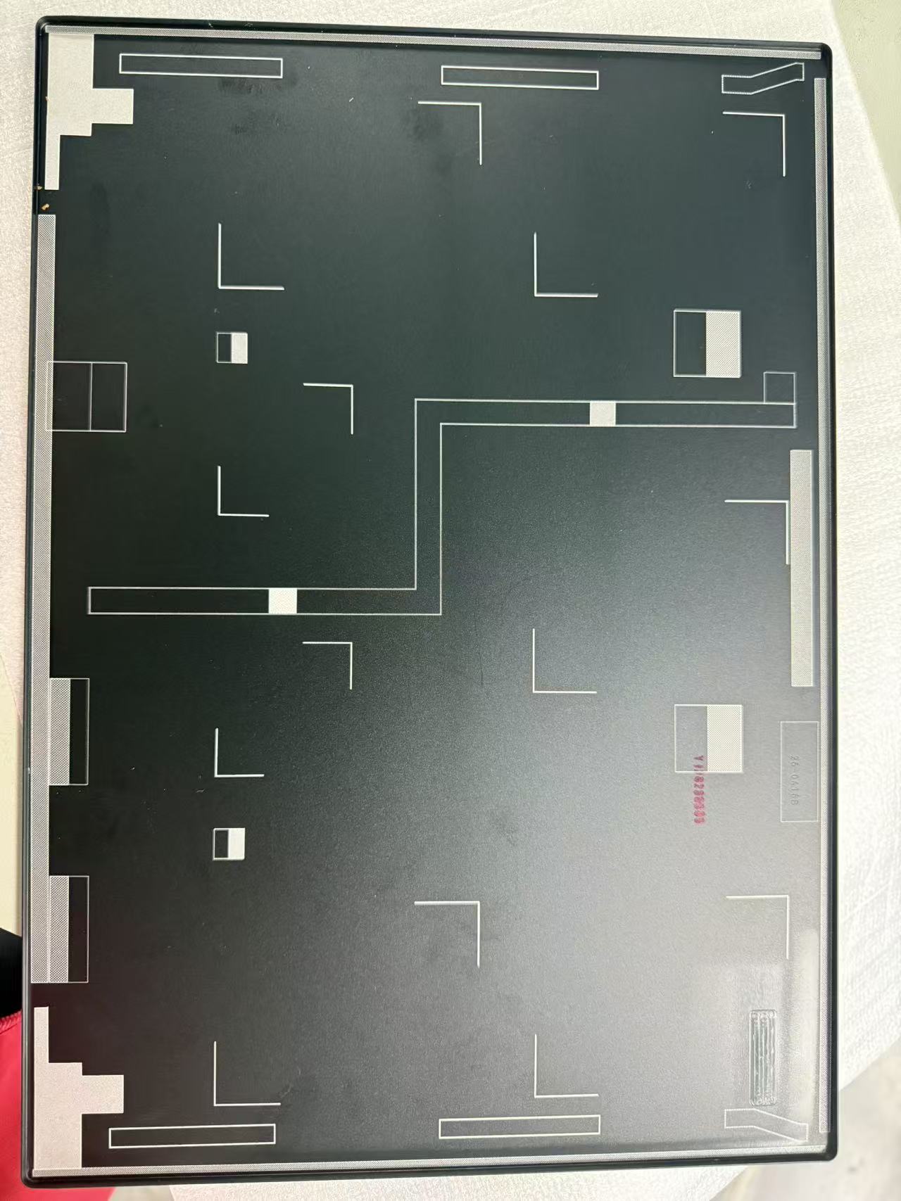 Final quality inspection of laser anodizing removal on notebook housing