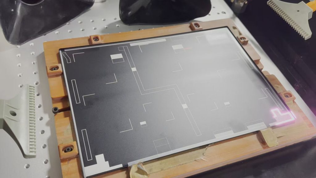 Laser anodizing removal process showing precise layer removal on A-side cable routing area