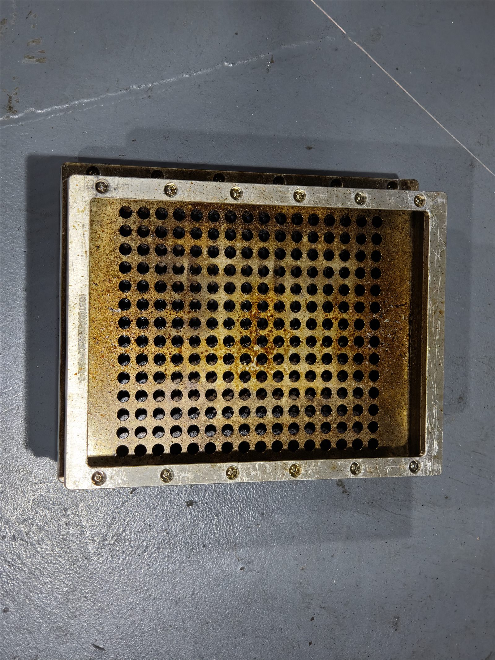 Customer sample testing for residue removal on reflow carrier tray surfaces