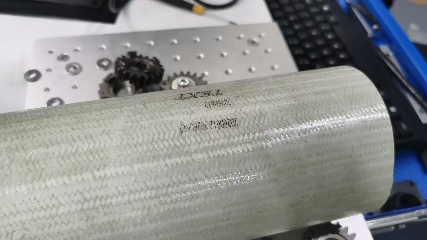 Readable text and date code marked on glass fiber tube by fiber laser marker