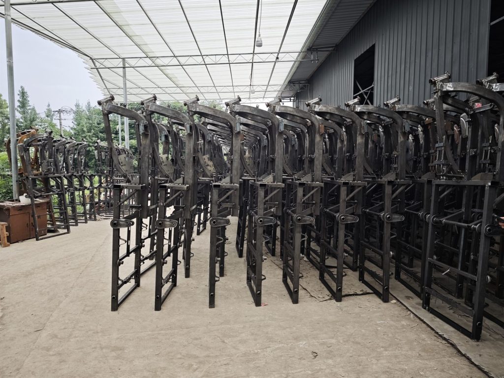 Batch of tricycle frames prepared for onsite pneumatic dot peen marking delivery