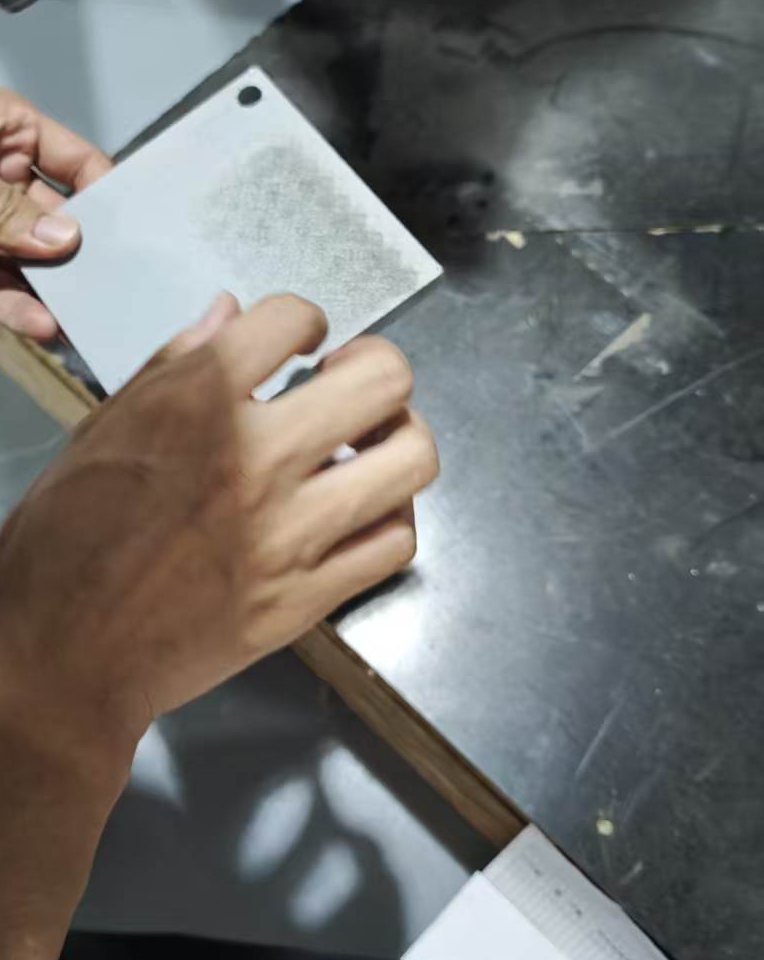 Galvanized sheet sample inspection after selective laser ablation and paint layer removal