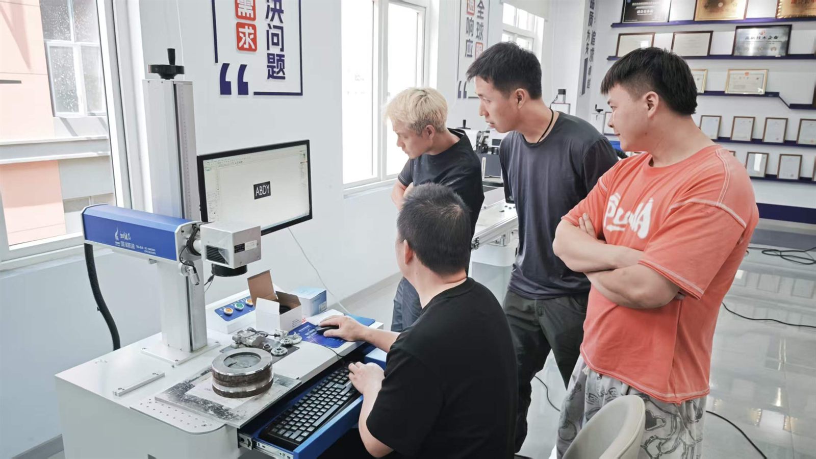 Customer visit for 100W MOPA laser deep engraving test on an automotive casting and forging mold