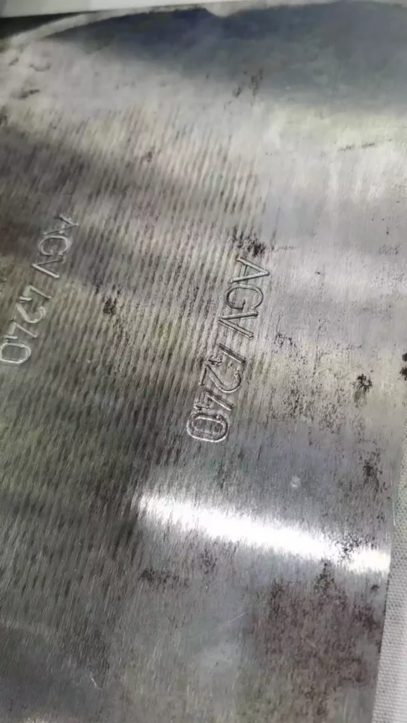 A finished marking sample — deep, clear and permanent characters.