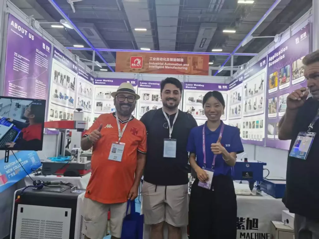 The Zixu Machine Works team with a visiting buyer at the 140th Canton Fair.