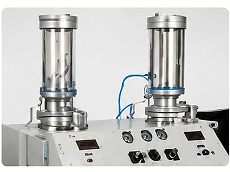 Dual-hopper precision powder feeder: continuous, without pulsing